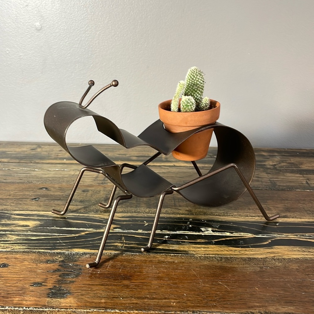Ant succulent planter or candle holder.  Pot and plant not included.  Metal